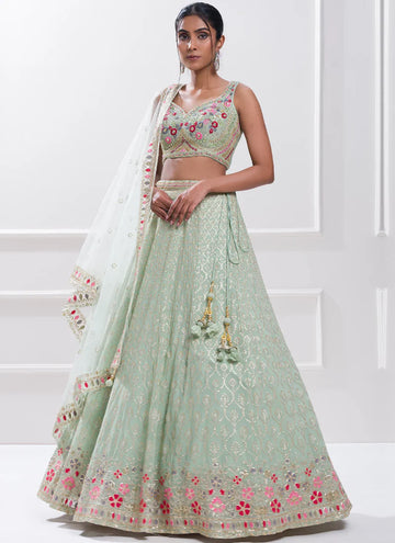 Party wear Sea green Designer lehenga with real mirror and sequin thread work.